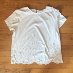 White top with little cutouts